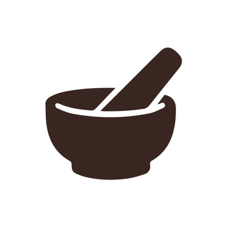 A clean, minimalist dark brown icon of a mortar and pestle. Ideal for pharmacy, medicine, herbalism, cooking, and science-related designs.のイラスト素材