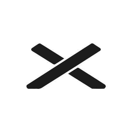 A minimalist black cross or 'X' icon on a white background. This simple, bold vector graphic is ideal for close, delete, or error notifications.のイラスト素材