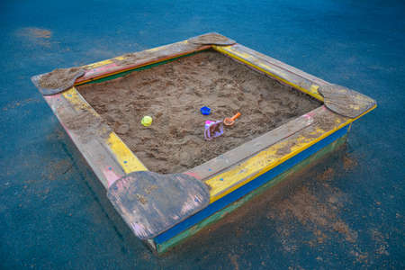 Sandbox with toys on the children's playground. Copy space for textの写真素材