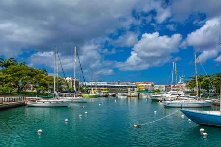 Bridgetown, Barbados - 22 Sept 2018: Sailing yachts moored in the downtown marina bay of Bridgetown,...
