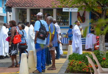 Sainte Anne, Martinique - Sept 19, 2018: Elderly people on the street during a festive church procession in Sainte Anne, Martiniqueのeditorial素材