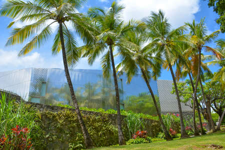 Le Francois, Martinique, West Indies - Sept 18, 2018: Modern building of museum and rum factory with palm trees in Habitation Clement on Martiniqueのeditorial素材