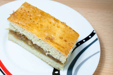 A piece of homemade apple pie on a plateの写真素材