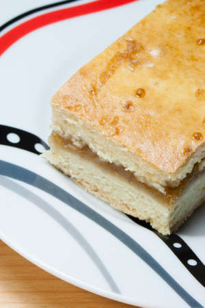 A piece of homemade apple pie on a plateの写真素材