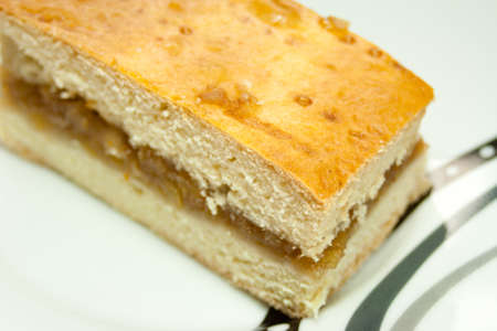 A piece of homemade apple pie on a plateの写真素材