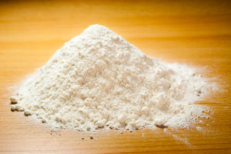 Flour on a wooden tableの写真素材