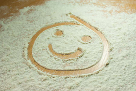 Flour on a wooden tableの写真素材