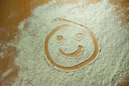 Flour on a wooden tableの写真素材
