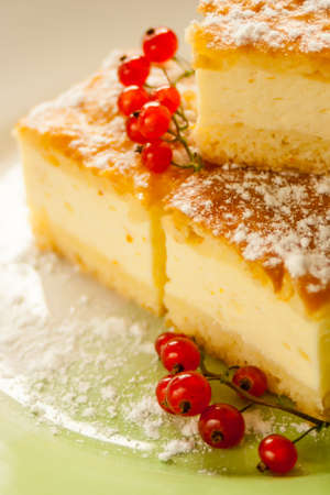 Home made Cheese cake with fruits on a plate.の写真素材