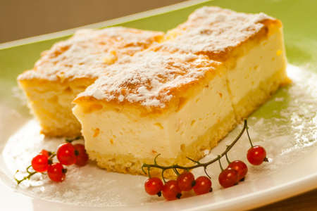 Home made Cheese cake with fruits on a plate.の写真素材