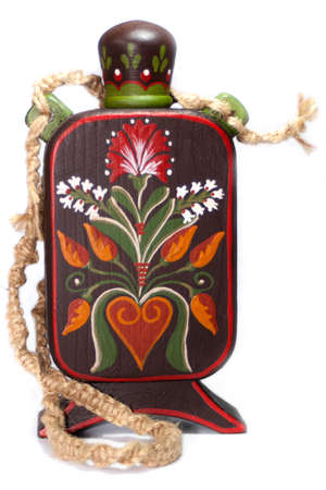 Decorative traditional wooden flask with belt の写真素材