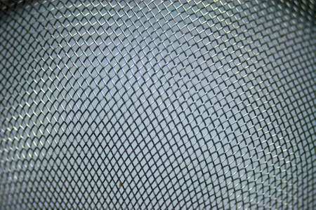 Metal grid background from filterの写真素材