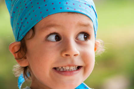 Happy smiling boy with toothy grin の写真素材