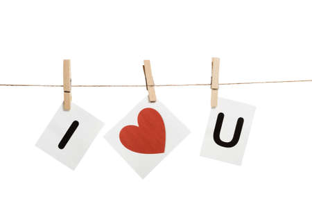 Love message held by clothespinsの写真素材