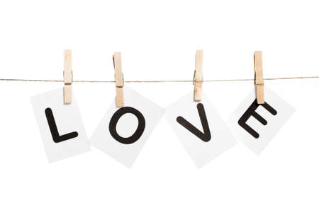 Love message held by clothespinsの写真素材