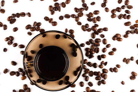 Coffee cup with coffee beans on white .の写真素材