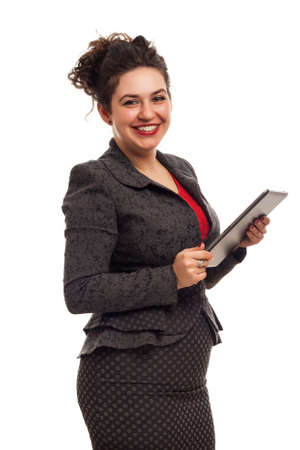 Confident business woman portrait with tablet isolated over a white の写真素材