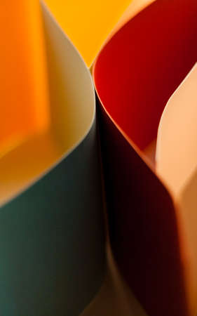 Colorful paper in unique shapes with shadow effect and selective focus.の写真素材
