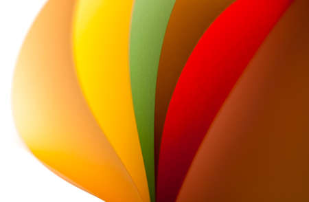 Colorful paper in unique shapes with shadow effect and selective focus.の写真素材