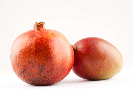 two ripe exotic fruits on white backgroundの写真素材