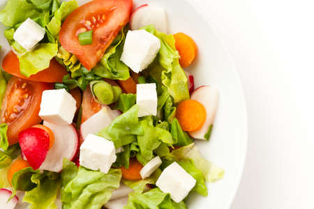vegetable salad close up in a white bowlの写真素材