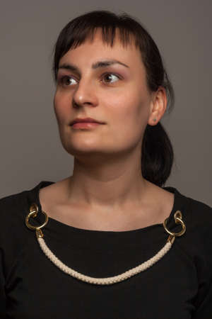 portrait of a stylish expressive woman in studioの写真素材