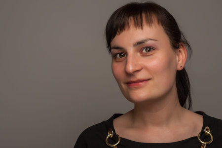 portrait of a stylish expressive woman in studio