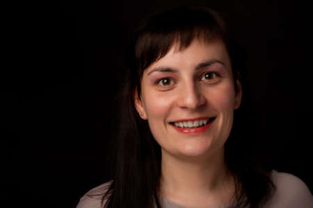 portrait of a stylish expressive woman in studioの写真素材