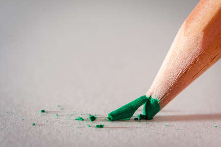 close up of color pencil head breakingの写真素材