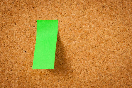 image of color blank post-it reminder on corkboardの写真素材