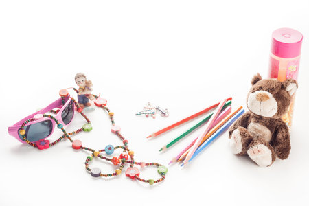 colorful little girl accessories, necklace, hairpins, pencilsの写真素材