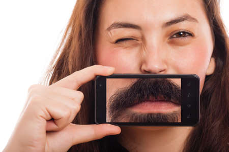 woman portrait with phone and image of a mens mouthのeditorial素材