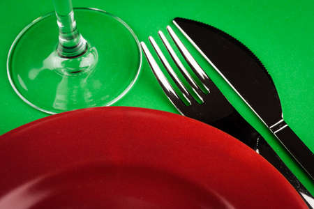 table setting close up on green tableの写真素材