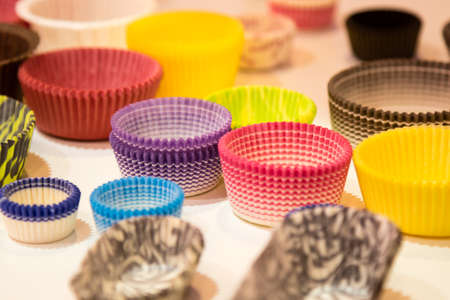 color muffin cupcake papers of different sizesの写真素材