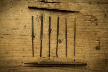 old vintage retro used rasps on wooden table