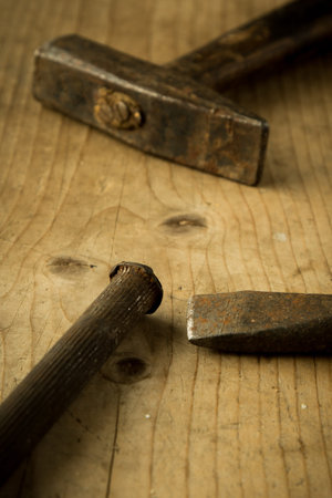 old vintage retro used tools on wooden tableの写真素材
