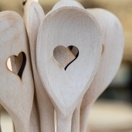 wooden spoon with hearth shape in the middleの写真素材