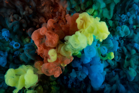 Abstract acrylic paint color swirls in water, shot from below, background.