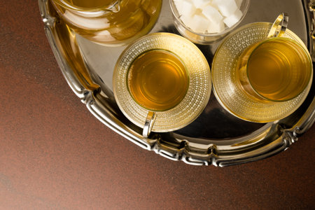 fresh natural organic hot tea in stylish glass mugの写真素材