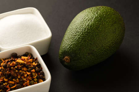 fresh healthy green avocado fruit with  condimentsの写真素材
