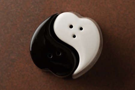 salt and pepper shakers in yin yang formの写真素材
