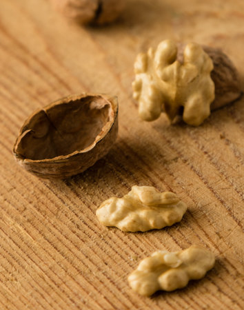 raw brown broken natural rustic walnuts on table