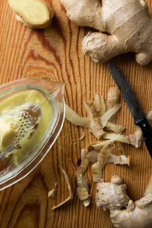fresh ginger pealed and prepared in glass grater