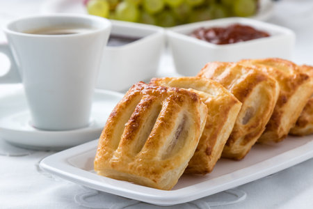 fresh sweet puff pastry breakfast on white table and plate