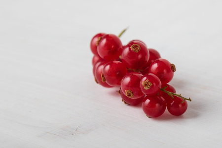 fresh ripe red currant on white tableの写真素材