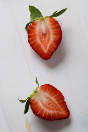 fresh ripe red strawberries on white table