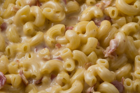 fresh tasty macaroni and cheese close upの写真素材