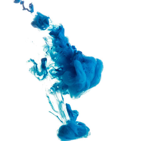 Abstract acrylic paint color swirls in water on white backgroundの写真素材