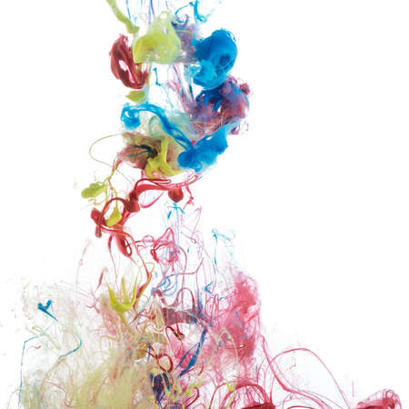 Abstract acrylic paint color swirls in water on white backgroundの写真素材