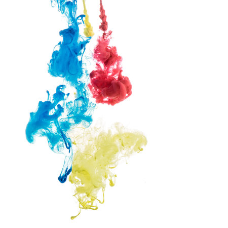 Abstract acrylic paint color swirls in water on white background